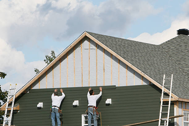 Professional Siding technician working in Centreville, MD